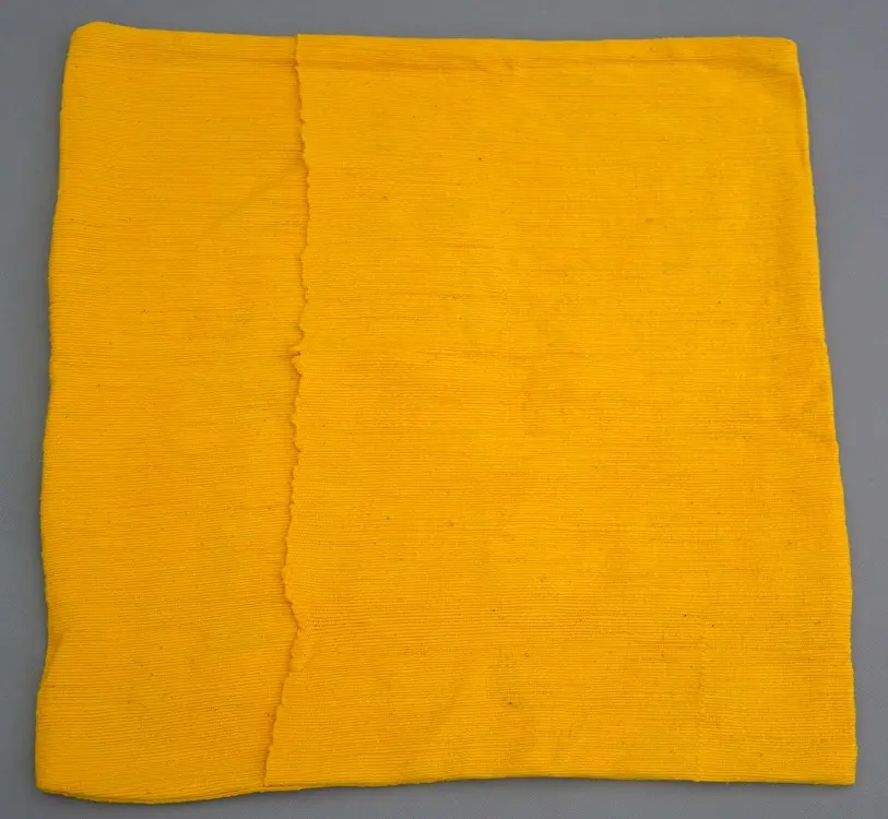Housse de coussin Sphère Rouge en coton éthiopien filé, tissée et brodée à la main