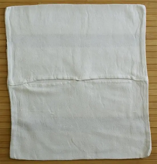 Housse de coussin Tribu Bleu avec Tibeb majoritairement en coton éthiopien, tissée artisanalement