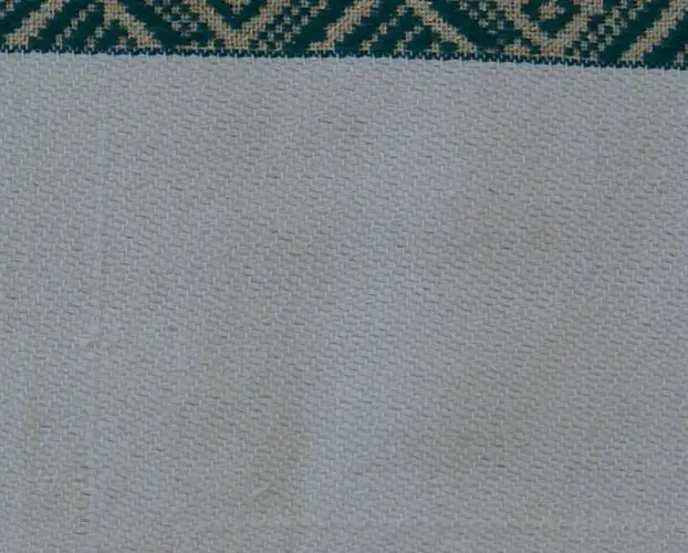 Housse de coussin Tribu Vert avec Tibeb majoritairement en coton éthiopien, tissée artisanalement