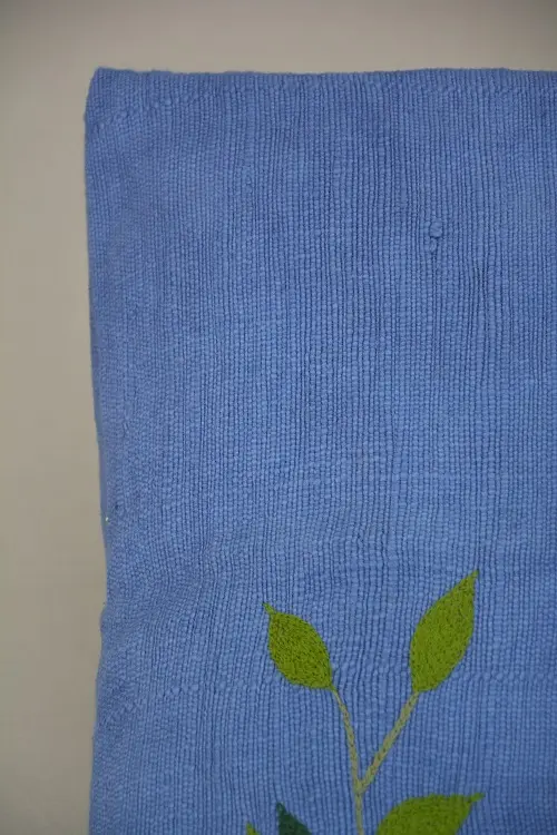 Housse de coussin Rameau Bleu en coton éthiopien filé, tissée et brodée à la main