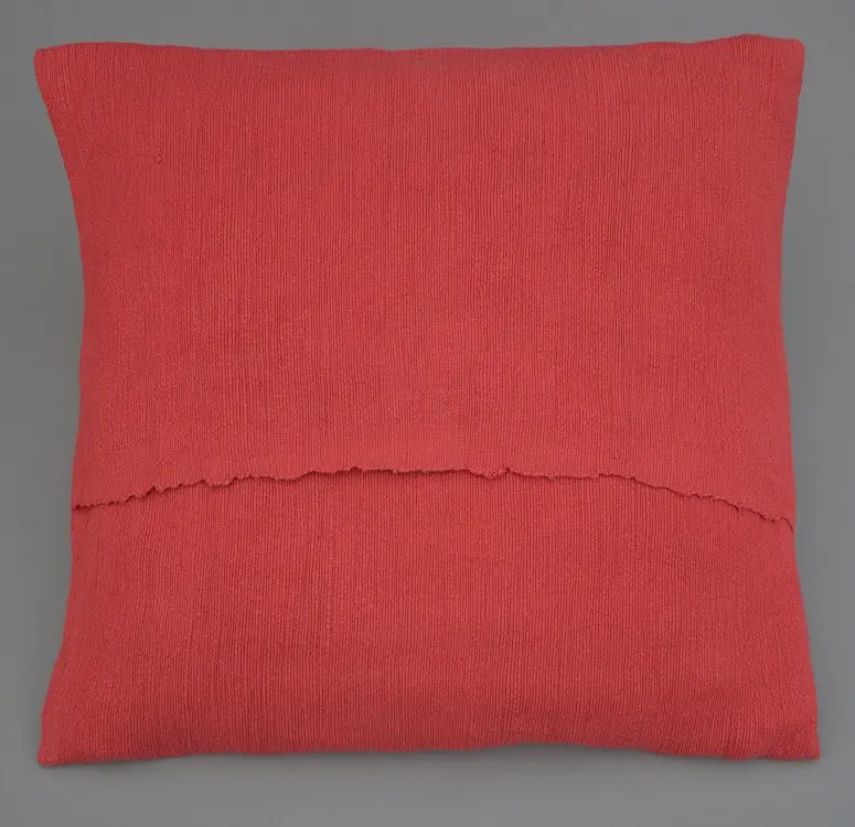 Housse de coussin Rameau Capucine en coton éthiopien filé, tissée et brodée à la main
