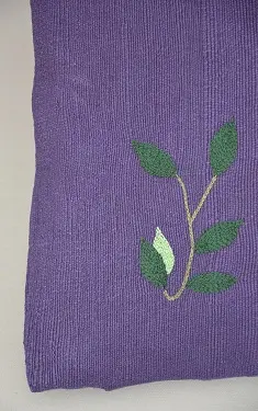 Housse de coussin Rameau Iris en coton éthiopien filé, tissée et brodée à la main