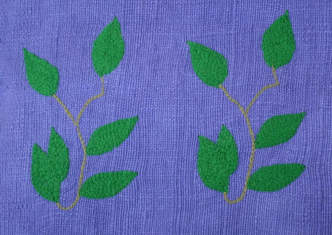 Housse de coussin Rameau Klein en coton éthiopien filé, tissée et brodée à la main