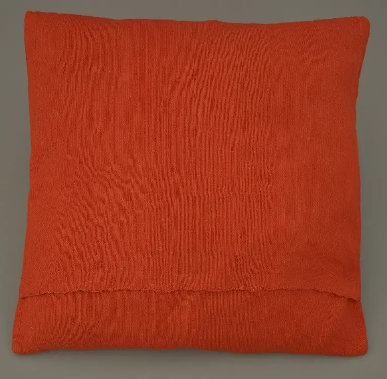 Housse de coussin Sphère Cardinal en coton éthiopien filé, tissée et brodée à la main